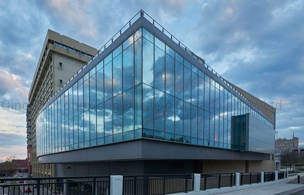 اجراى نماى كرتين وال و نماى شيشه اى ساختمان