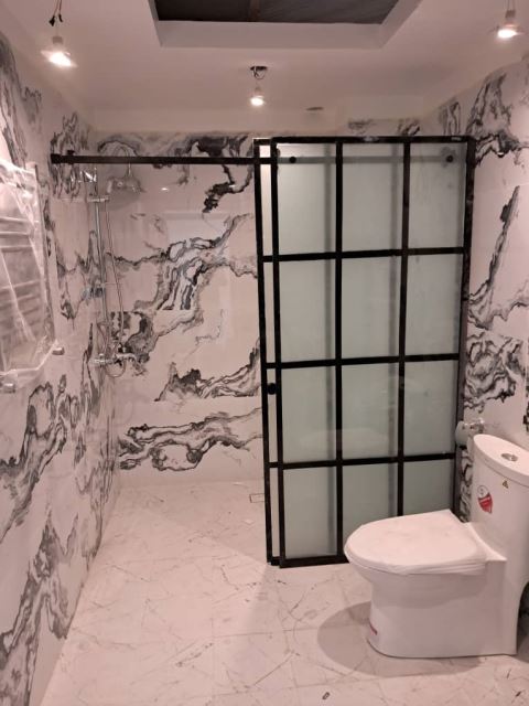 اجرای کرتین وال و نمای شیشه ای ساختمان در تهران