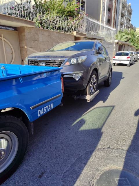 حمل خودرو در میانه 